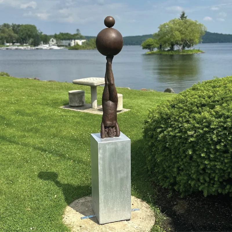 A photo of the sculpture "Balancing Act - Expectations" by Josie Campbell Dellenbaugh
